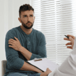 man in counselling session